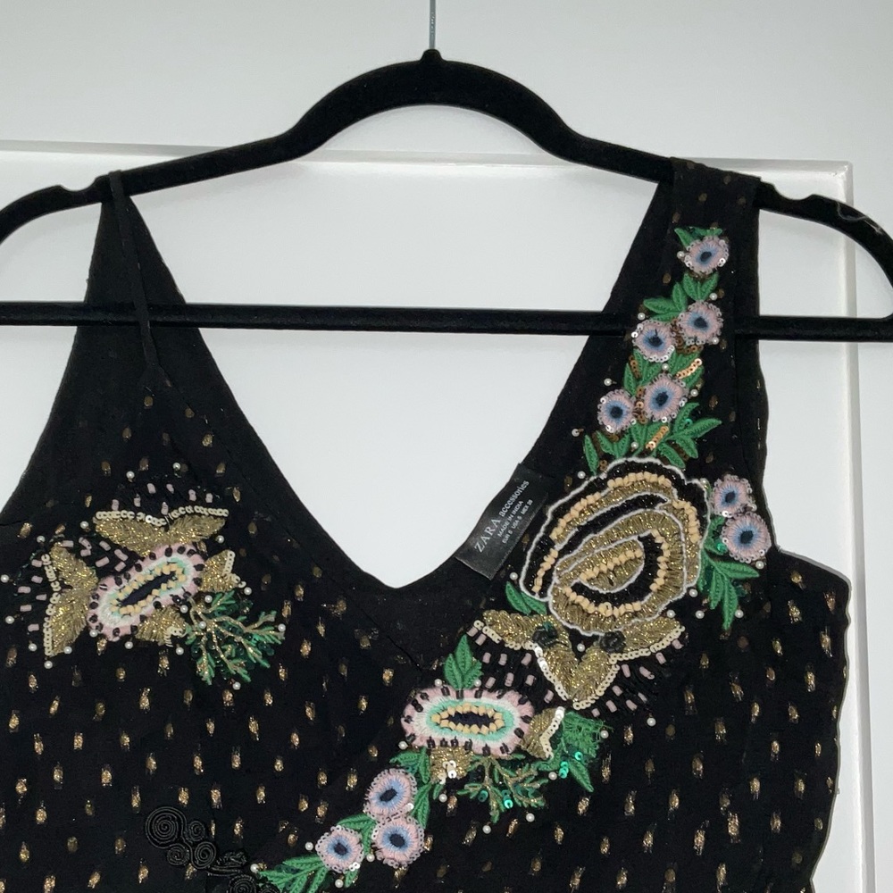 Black and gold bodysuit with multi color beading and embroidery. Worn once.